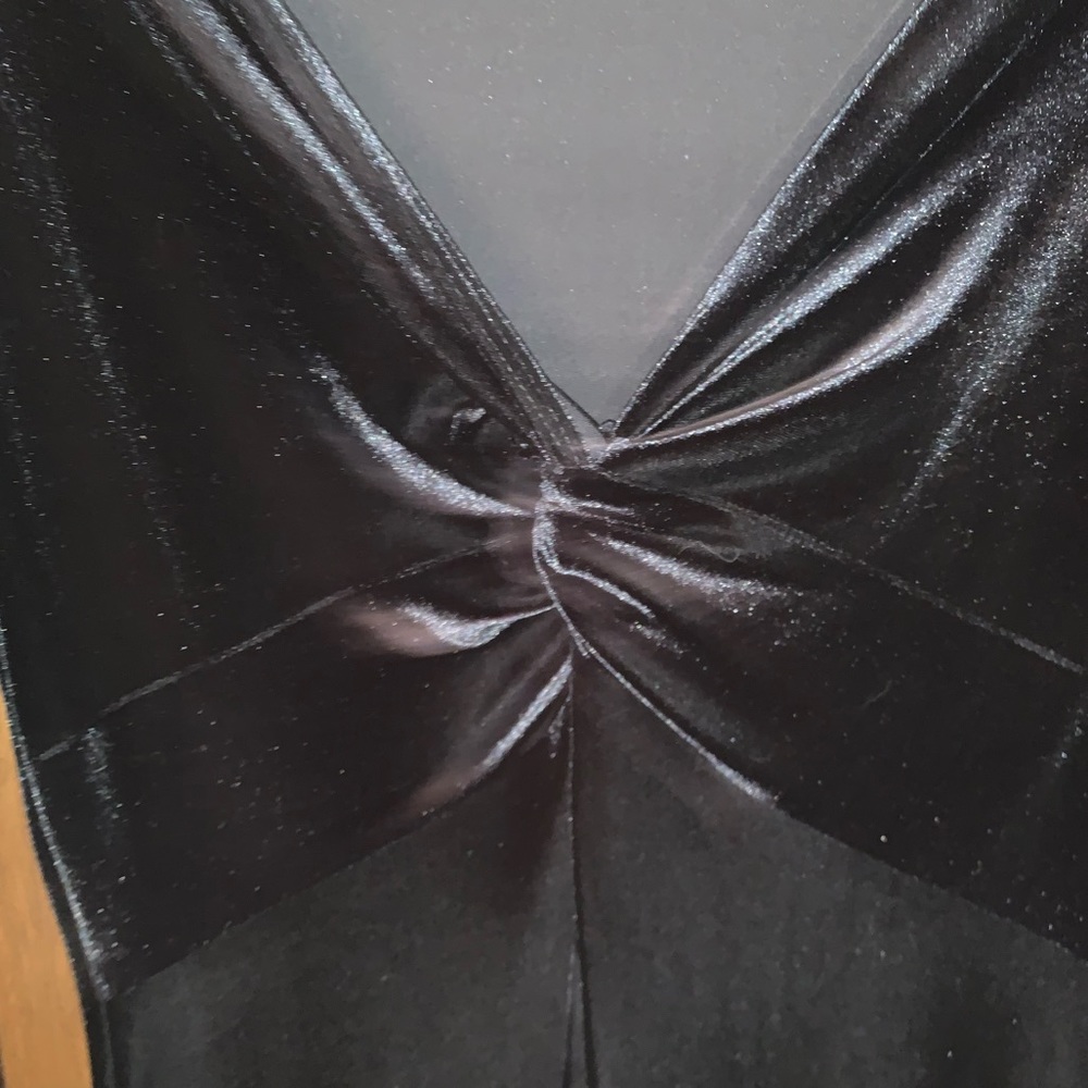Black velvet dress with bell sleeves with slits